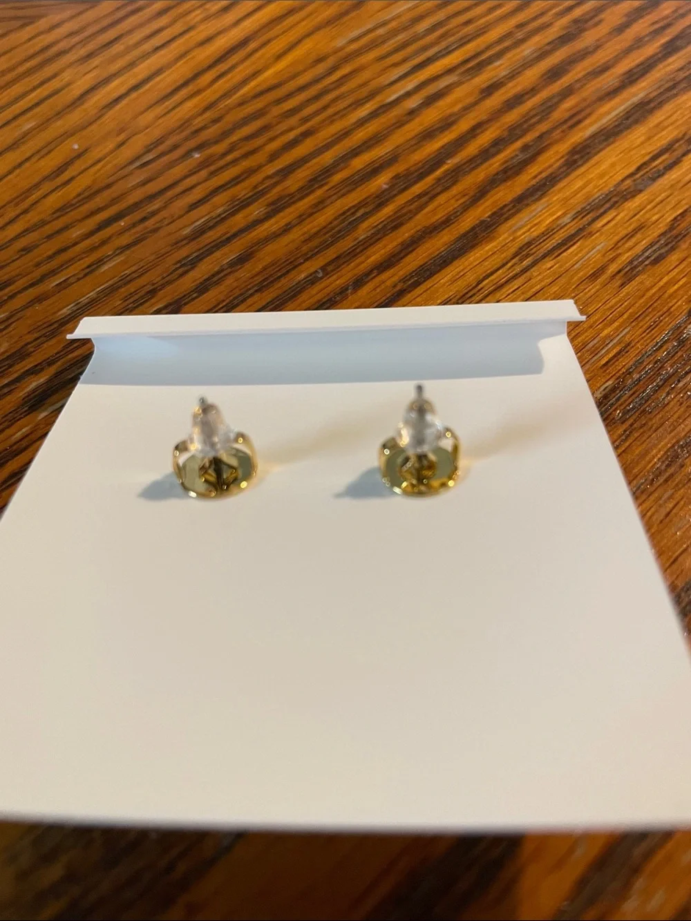 Brand new pearl-drop earrings by Tory Burch.